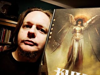 Frank with the book Kult: Divinity Lost.