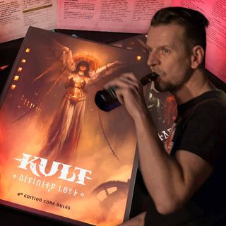 A picture of Dan with the Kult books.